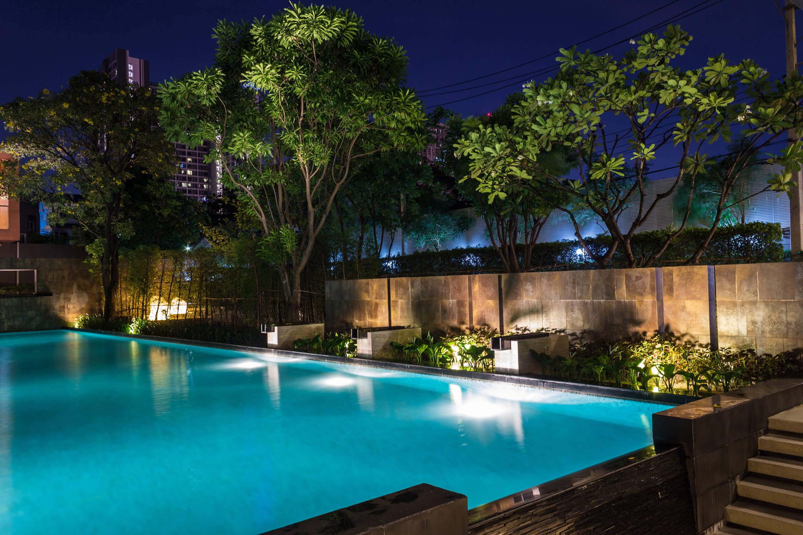 Lighting business for luxury backyard swimming pool.  Relaxed lifestyle with contemporary design by professionals.
